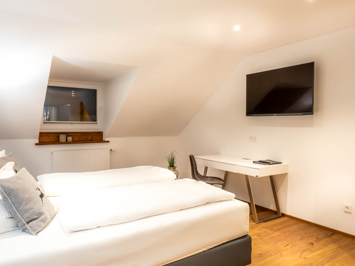 Hotel Allgäuherz Suite "Allgäu" - Schlafzimmer mit Doppelbett
